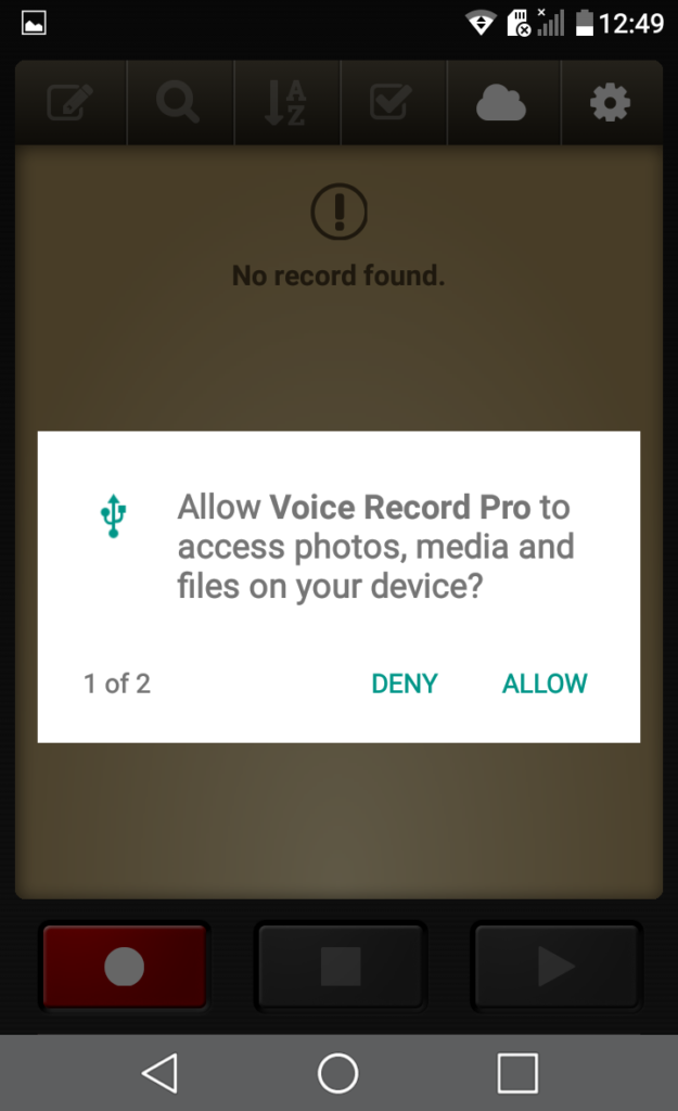 Screenshot of Voice Record Pro on a phone with a permissions request to access photos, media and files on the device.